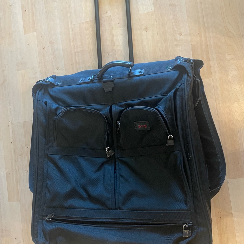 Tumi Black Durable Travel Luggage